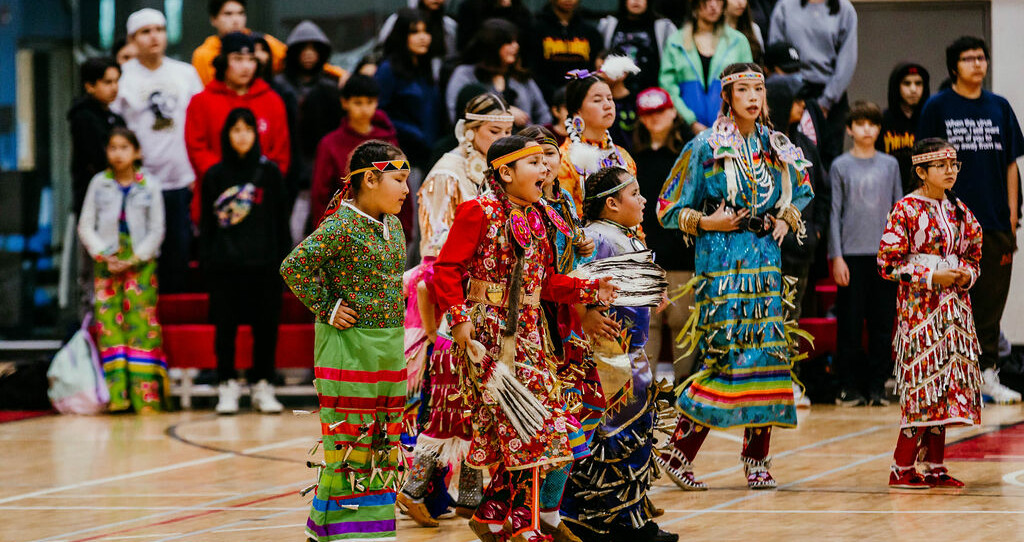 students dancing during school Pow Wow